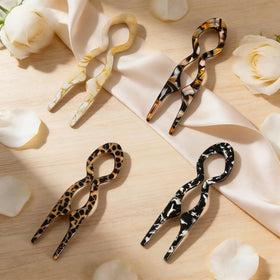 Twoheadpig hair pin securing a sleek bun for polished all-day wear