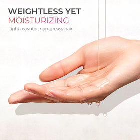 TYMO bottle held in hand to show size and travel-friendly convenience