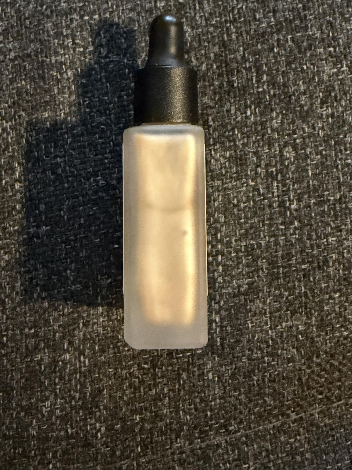 Typology Glow Drops mixed with moisturizer demonstrating blendability