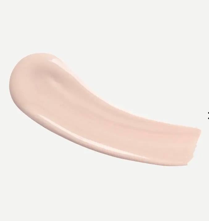 Typology tinted serum texture closeup on skin highlighting lightweight blendable hydration