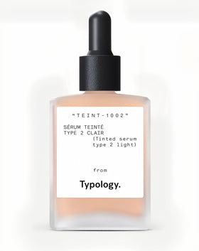 Typology tinted serum front vial showing label and pump for easy application benefit