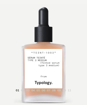 Typology serum texture drop closeup highlighting vitamin C glow and lightweight hydration