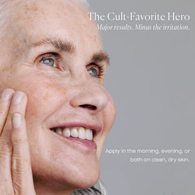 U Beauty bottles in hand for scale indicating travel-friendly size