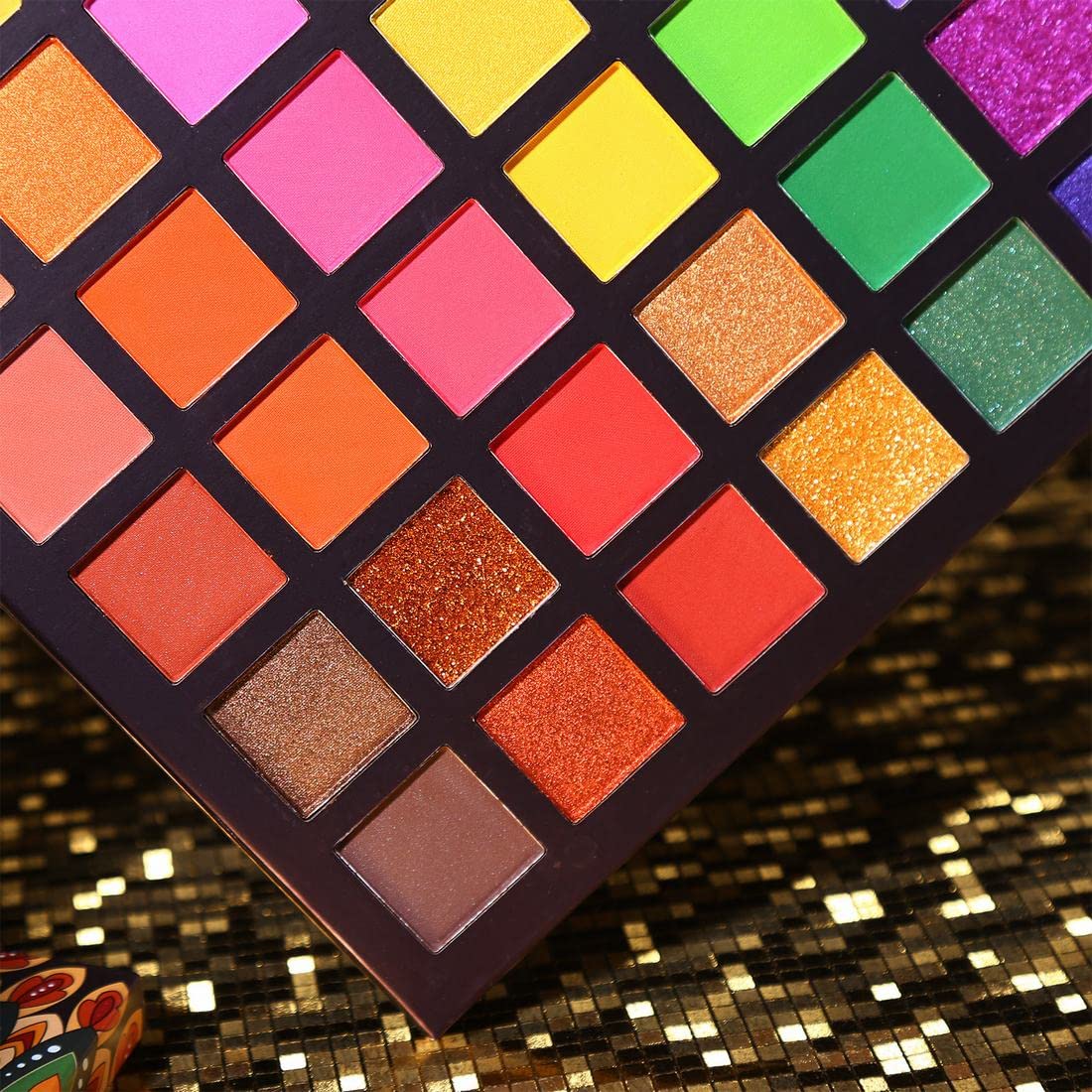 UCANBE packaging detail with peacock emboss showing exotic design and premium feel