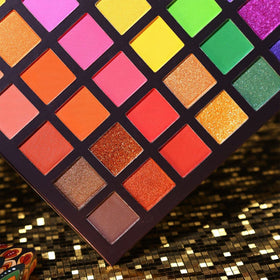 UCANBE packaging detail with peacock emboss showing exotic design and premium feel