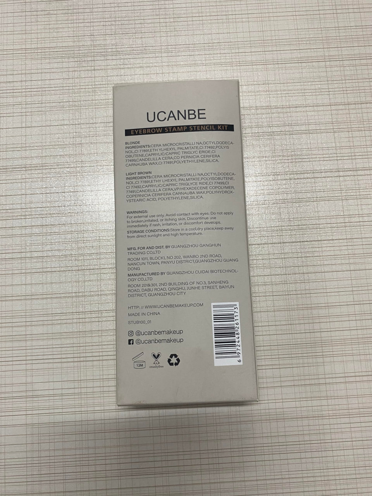 UCANBE scale with hand for size showing compact kit convenience for travel