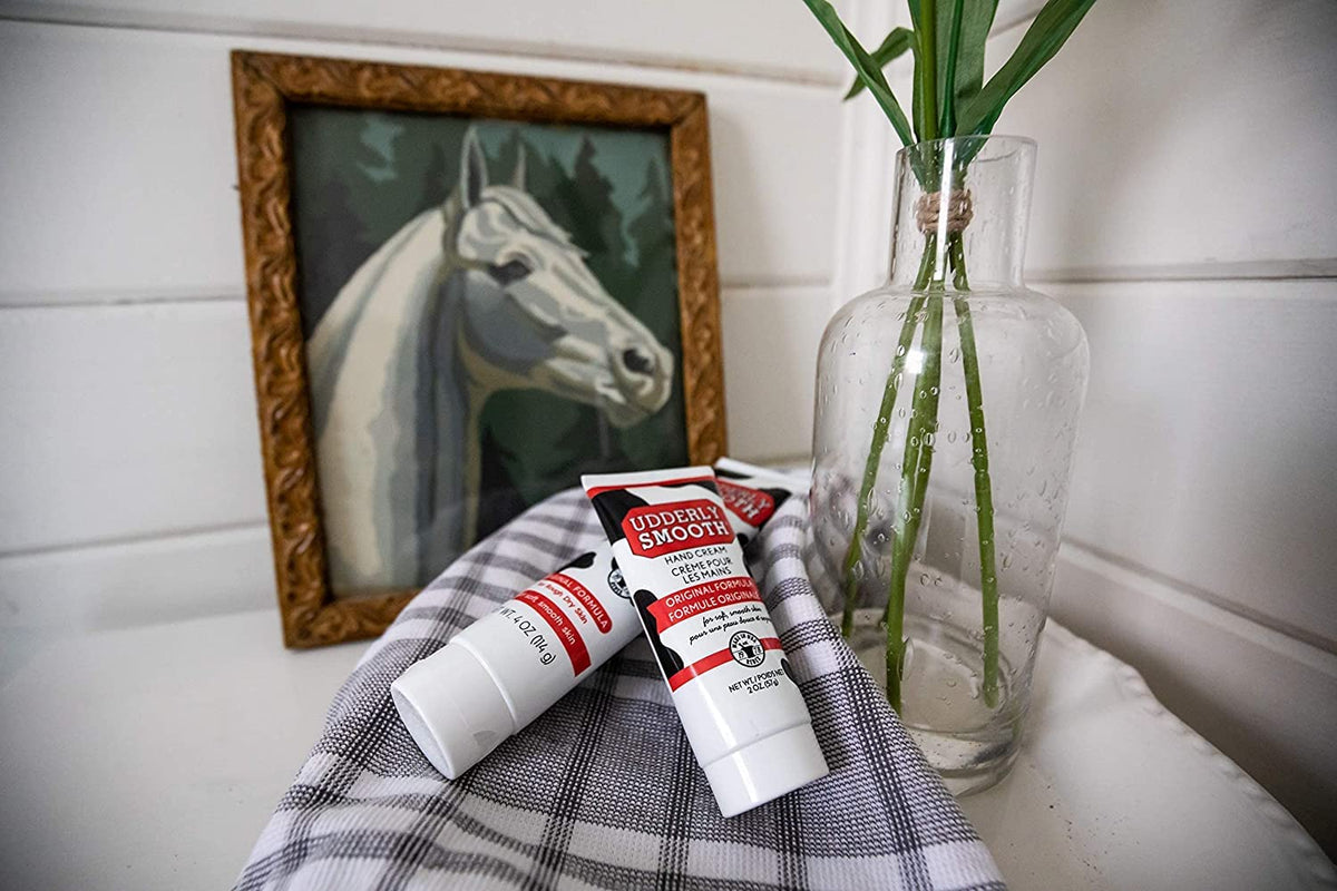 Udderly Smooth tubes on bathroom counter illustrating everyday convenience