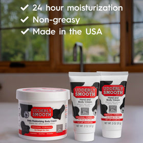Udderly Smooth hand cream 2 oz close-up tube highlighting fast-absorbing formula benefit