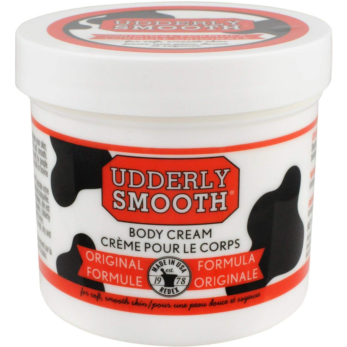 Udderly Smooth open jar texture close-up demonstrating smooth absorbent cream