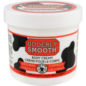 Udderly Smooth open jar texture close-up demonstrating smooth absorbent cream