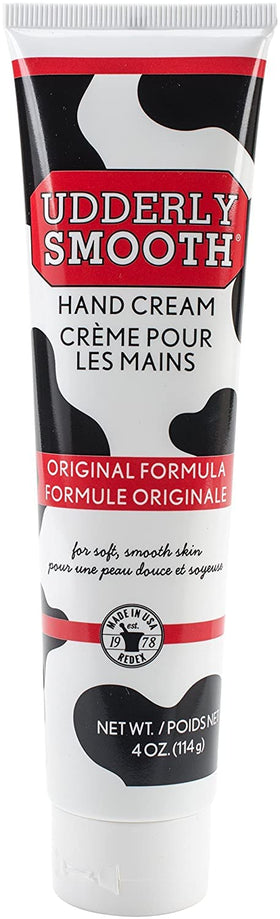 Udderly Smooth two-tube pack beside a ruler showing compact travel size