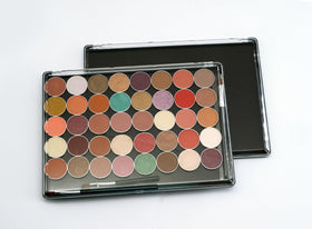 UDTIP palette held in hand to show scale and portable size for on-the-go use