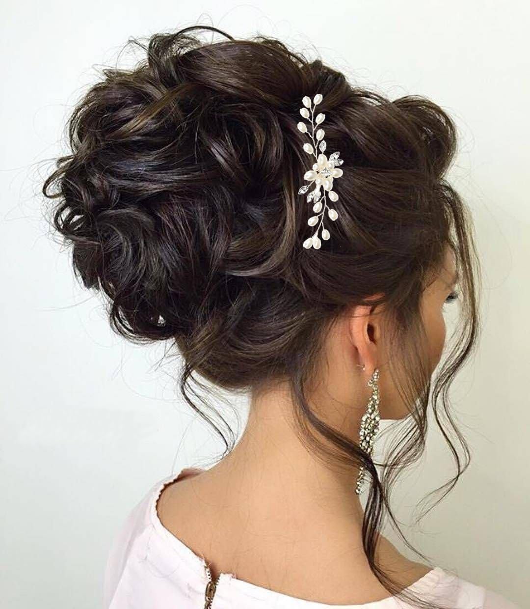 ULTIMUTE bridal lifestyle shot outdoors showing accessory enhancing wedding hairstyle