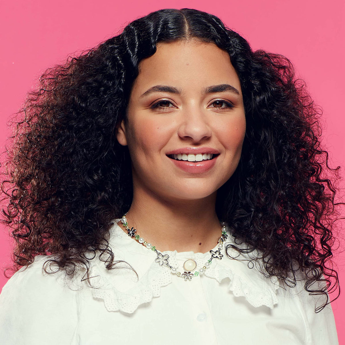 Umberto Giannini conditioner creamy texture swipe demonstrating smooth detangling