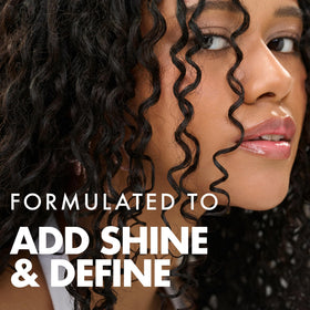 Umberto Giannini Crème de Curl cream pump detail showing hydrating formula