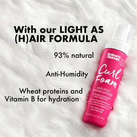 Umberto Giannini styled with diffuser showing lifted, soft curls