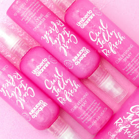 Label close-up of Umberto Giannini Curl Jelly highlighting vegan and silicone-free claims