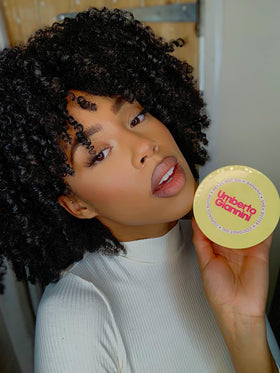 Umberto Giannini natural ingredients shot with banana and shea butter highlighting nourishment