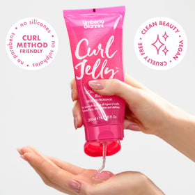 Umberto Giannini open jar displaying glossy jelly texture for easy scrunching