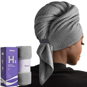Umisleep front packaging showing grey extra-large towel, clear product benefit