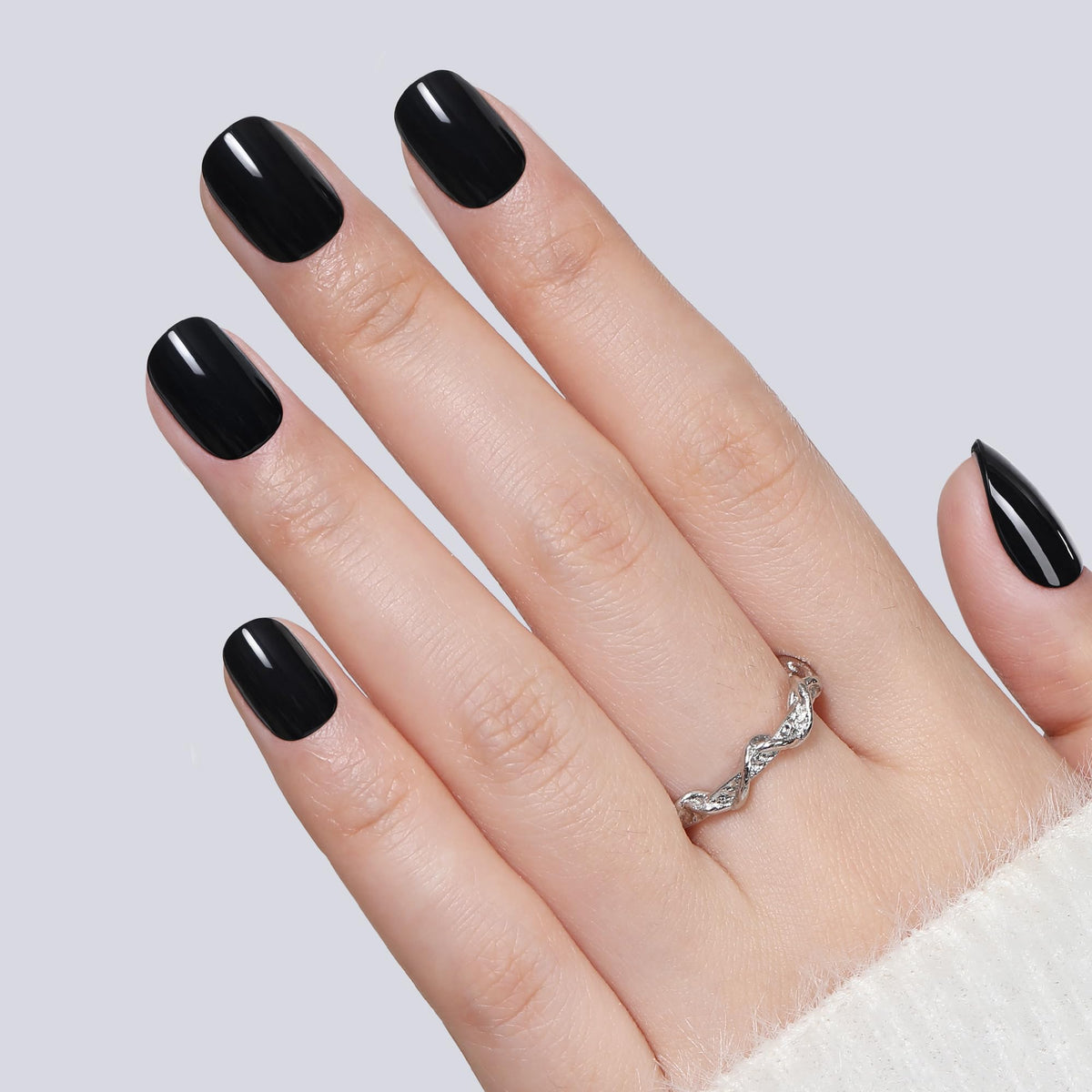 UNA GELLA close-up of glossy black finish highlighting salon shine