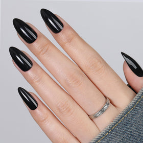 UNA GELLA array of 16 sizes laid out to show fit variety for different nail beds
