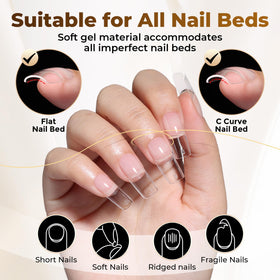 UNA GELLA tips in hand to show scale and how they sit on a finger