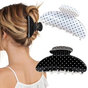 Unbednigt front view of two polka dot clips showing design and reliable hold