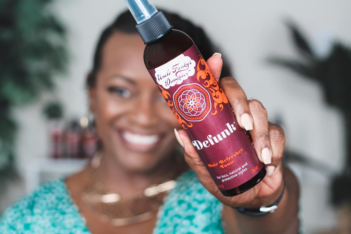 Uncle Funky's Daughter 8 oz bottle beside ruler to show actual product size and portability