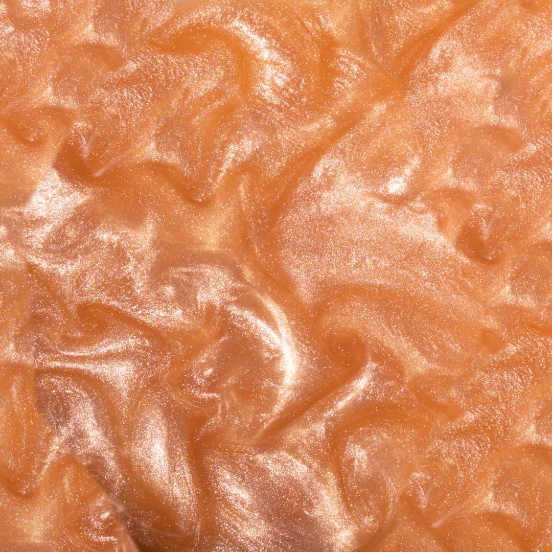 Unicorn Snot beach lifestyle shot showing water-resistant shimmer and outdoor wearability