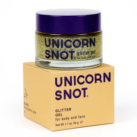 UNICORN SNOT gold jar front showing label and compact size for travel