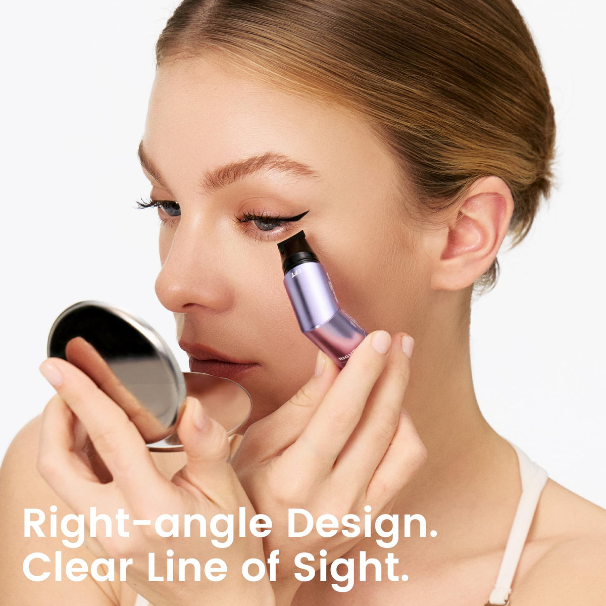Unicos pen being used at a mirror to stamp a wing for faster application