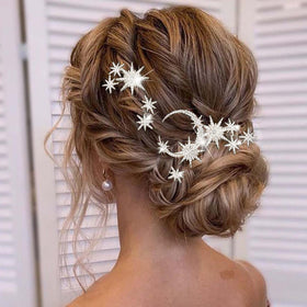 Unicra front view of five silver star moon hair pins highlighting elegant packaging and sparkle