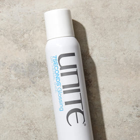 UNITE 7SECONDS close-up fine mist texture demonstrating weightless shine delivery