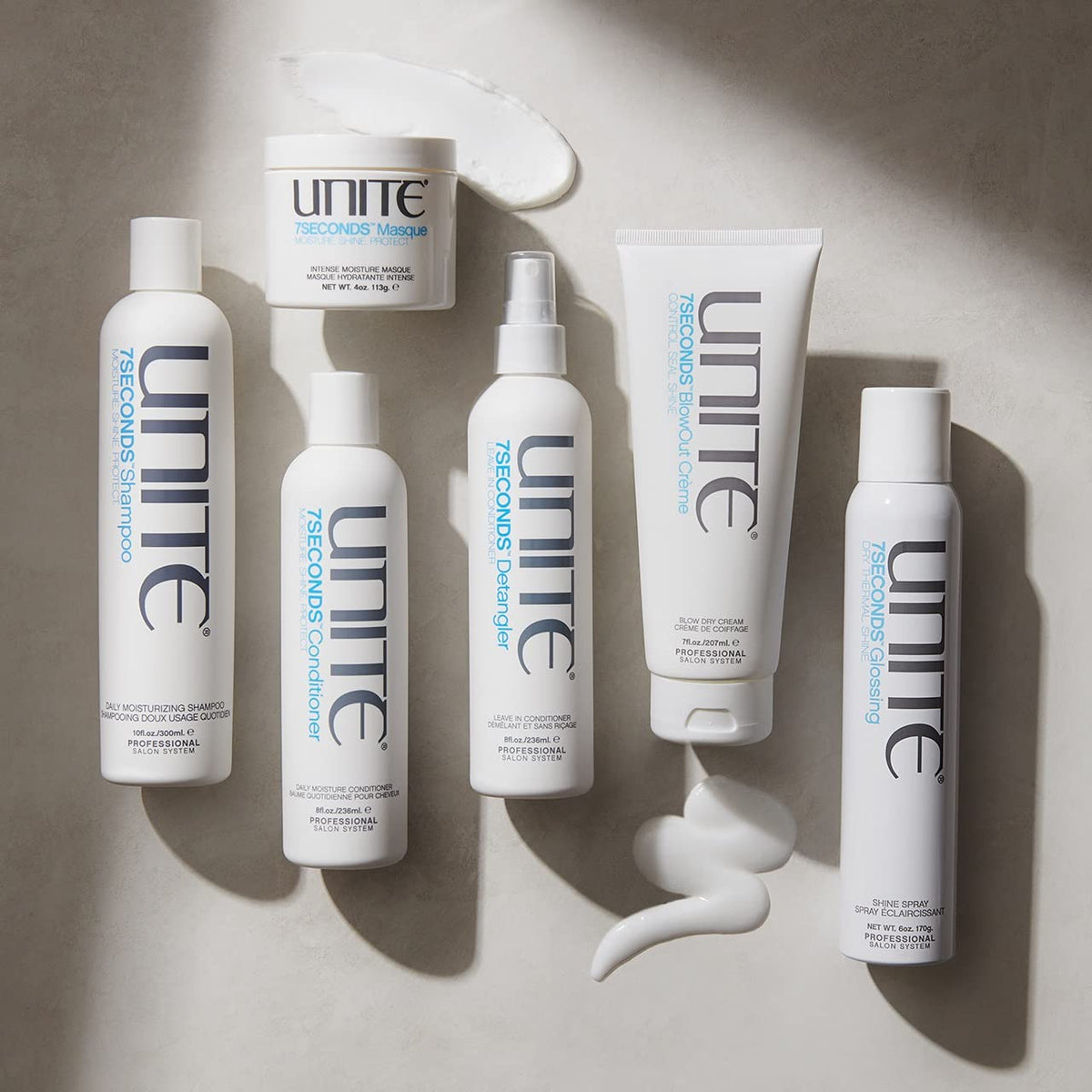 UNITE 7SECONDS in-use styling shot applied to dry hair for frizz control and gloss
