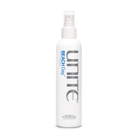 UNITE BEACH Day front bottle view highlighting packaging and easy spray action for texture