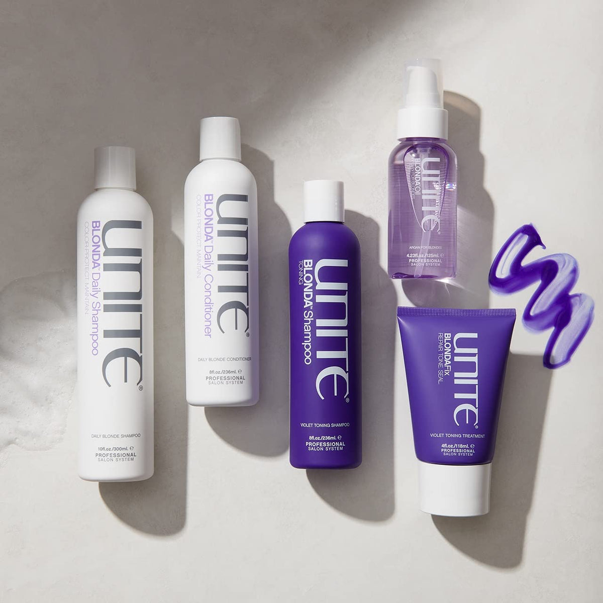 UNITE Hair bottle on bathroom shelf lifestyle display suggesting routine