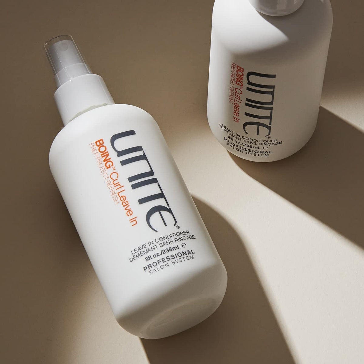 UNITE BOING mist spraying to detangle and add lightweight moisture