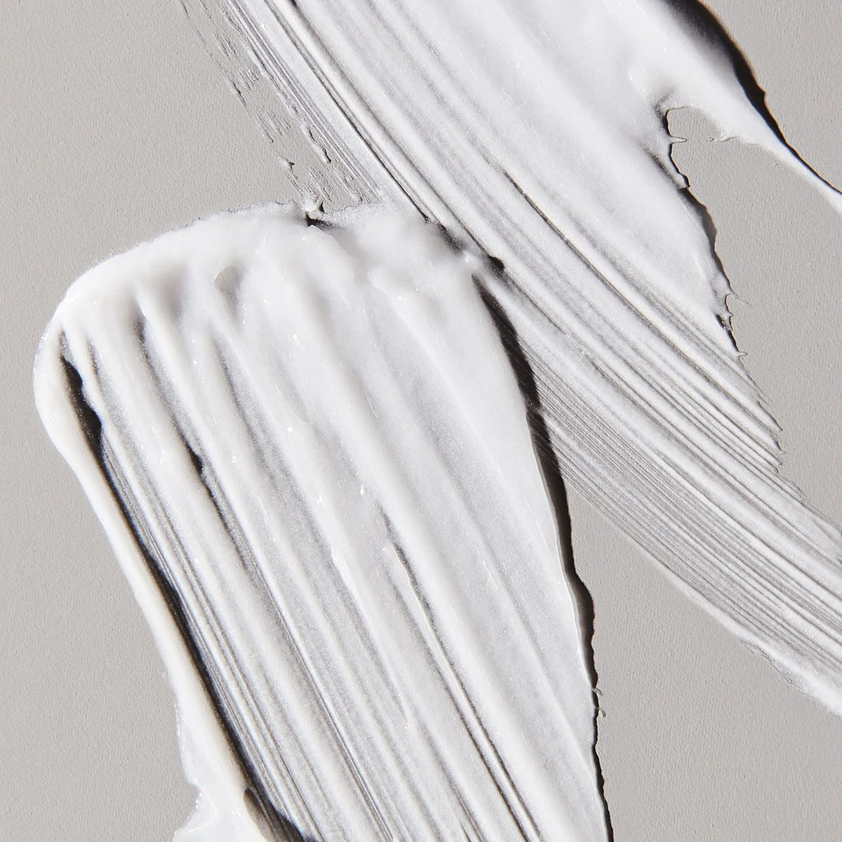 UNITE BOOSTA in use while blow-drying to create lift and fuller-looking hair