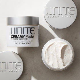 UNITE CREAMY Paste soft creamy texture close-up demonstrating pliability for styling control