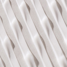 UNITE LAZER texture close-up showing creamy fluid for smooth application and soft finish
