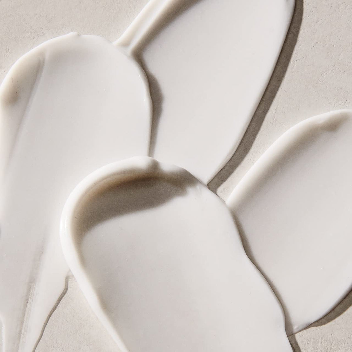 UNITE Smooth&Shine being applied to damp hair for faster blow-dry