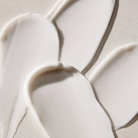 UNITE Smooth&Shine being applied to damp hair for faster blow-dry