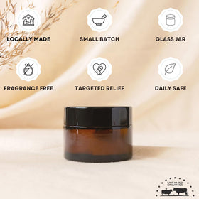Untamed Organics balm used on face to soothe and hydrate sensitive skin gently