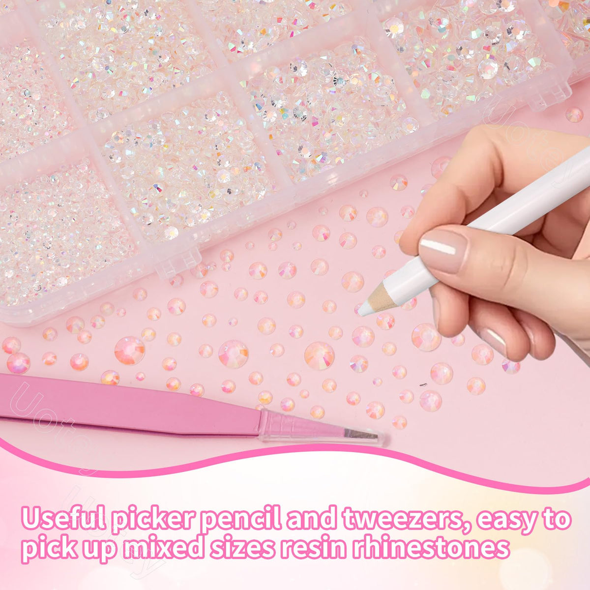 Uotey tweezers and pickup pen holding a gem for precise placement and ease