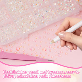 Uotey tweezers and pickup pen holding a gem for precise placement and ease