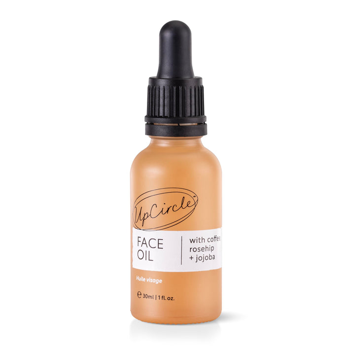 UpCircle front-facing 1oz bottle showing label and recyclable packaging benefit