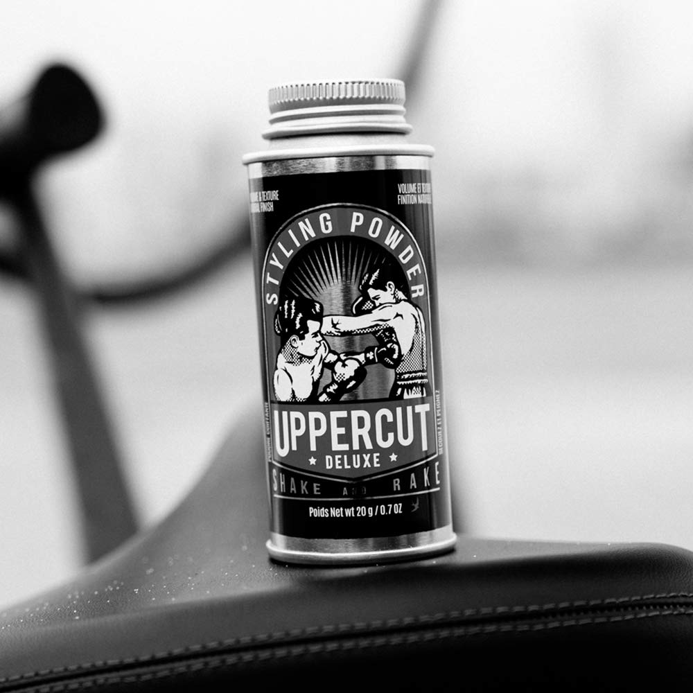 UPPERCUT DELUXE being shaken over dry hair for quick lift and body