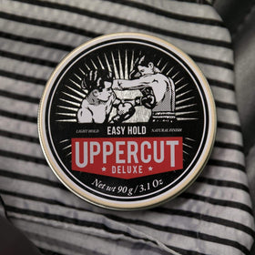 Styled textured men's hair using Uppercut Deluxe for natural separation