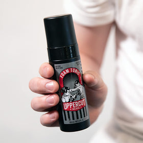 UPPERCUT DELUXE label close-up highlighting ingredients and conditioning benefit